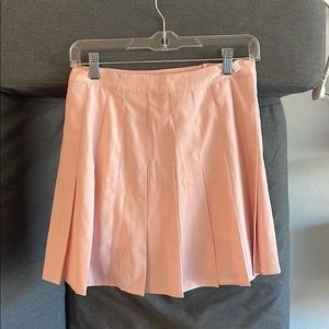 Pink pleated tennis skirt
